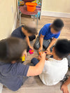 children playing with Silicone shapes for dementia sensory therapy