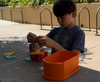 boy playing with Silicone shapes for dementia sensory therapy