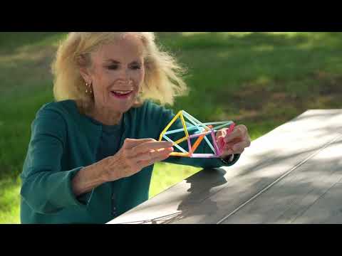 woman playing with sensory fidgets for cognitive engagement and dementia therapy 